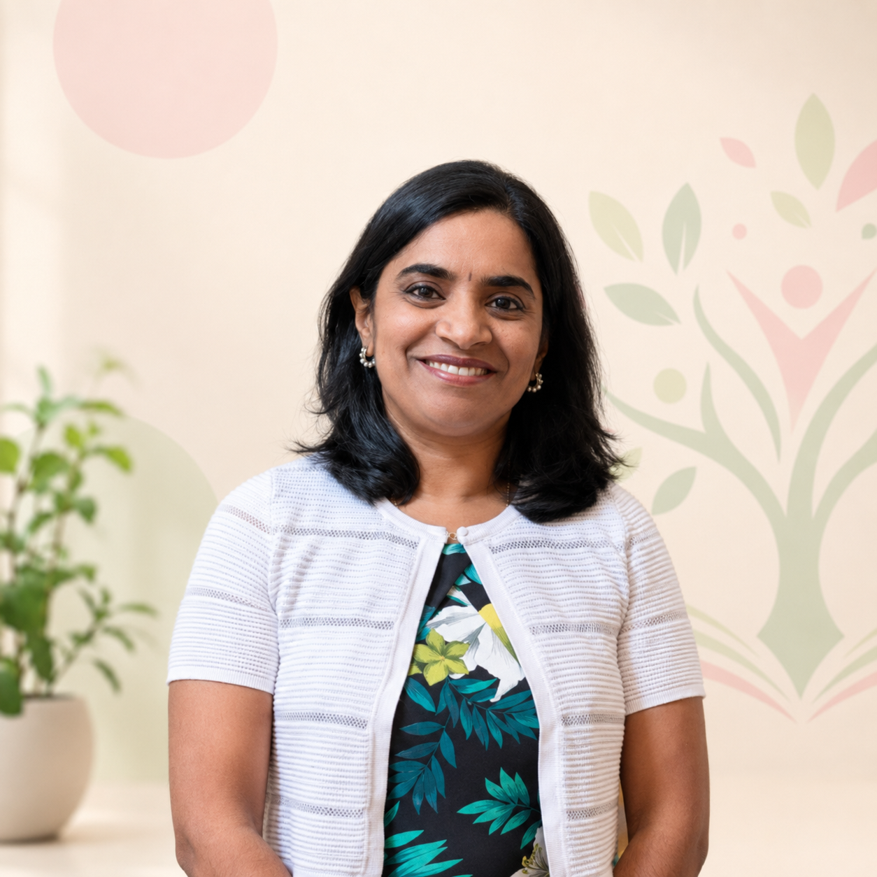 Bhuvaneswari Lakshmi Narayanan smiling in a warm professional portrait